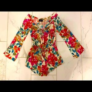 Floral long sleeved romper